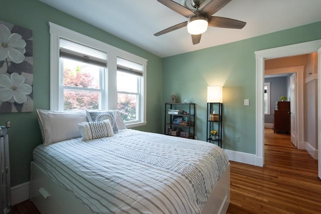 105 Fletcher St Unit 1, Boston, MA 02131 - bedroom featuring dark wood-type flooring and baseboards