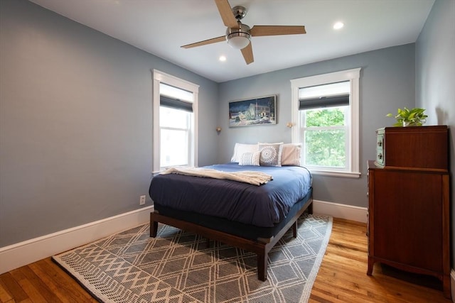 105 Fletcher St Unit 1, Boston, MA 02131 - bedroom featuring multiple windows, light wood-style flooring, recessed lighting, and a ceiling fan