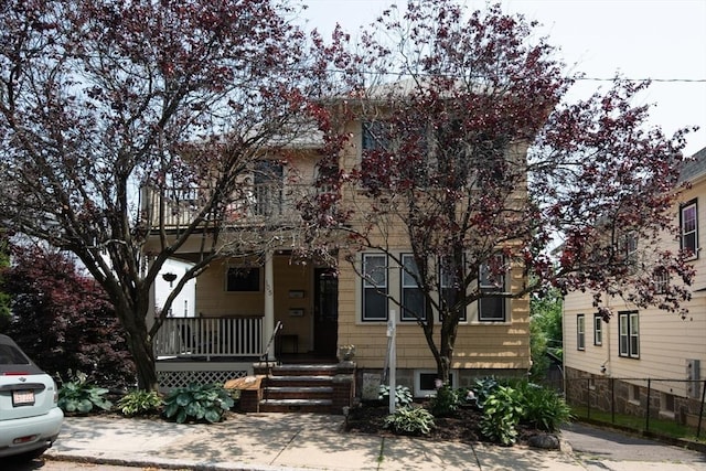 105 Fletcher St Unit 1, Boston, MA 02131 - obstructed view of property featuring covered porch