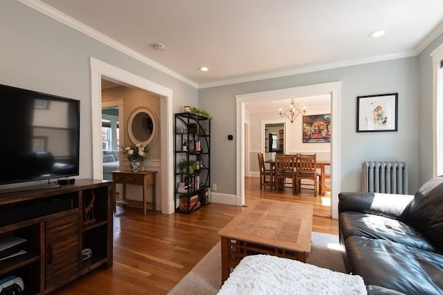 105 Fletcher St Unit 1, Boston, MA 02131 - living area with radiator, a chandelier, dark wood-style floors, crown molding, and recessed lighting
