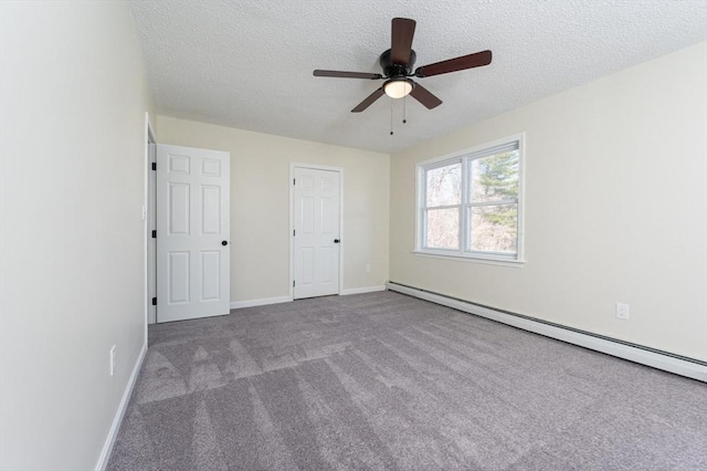 unfurnished bedroom featuring baseboards, carpet flooring, a textured ceiling, a ceiling fan, and a baseboard radiator