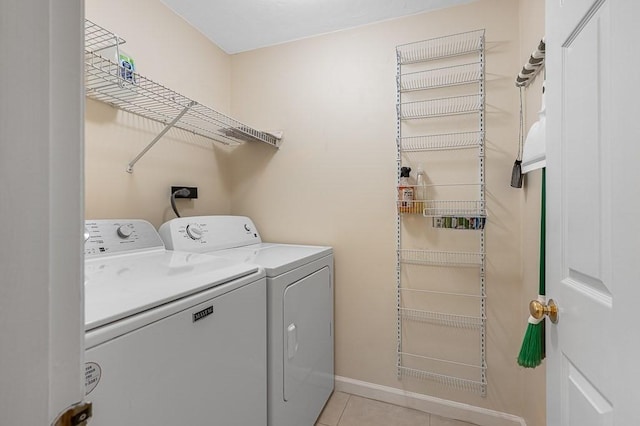 14 Midgley Ln, Worcester, MA 01604 - laundry area with washer and clothes dryer and light tile patterned flooring