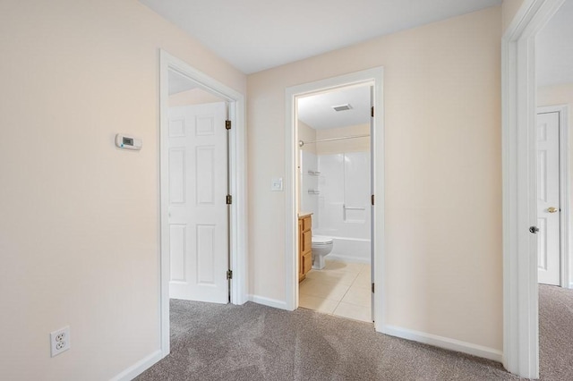 14 Midgley Ln, Worcester, MA 01604 - hallway featuring light colored carpet and light tile patterned floors