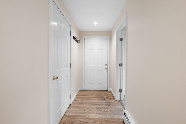 14 Midgley Ln, Worcester, MA 01604 - hallway with light wood finished floors, recessed lighting, and a baseboard heating unit
