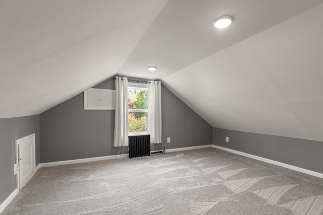 40 George St, Attleboro, MA 02703 - bonus room with radiator, vaulted ceiling, carpet floors, and baseboards