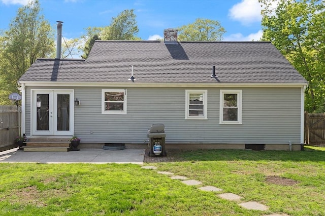 40 George St, Attleboro, MA 02703 - back of house with french doors, a chimney, roof with shingles, and a patio area