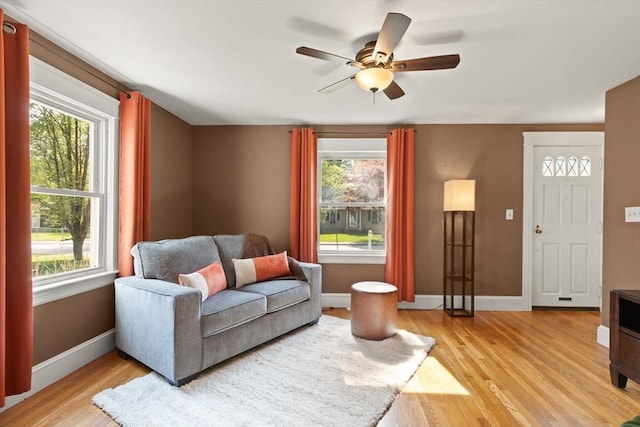 40 George St, Attleboro, MA 02703 - living room with plenty of natural light and light wood-type flooring