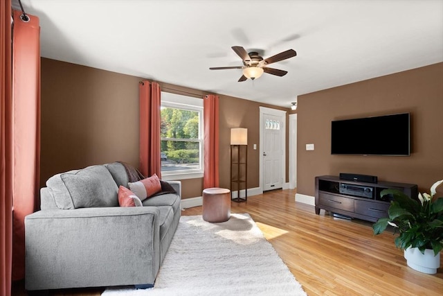 40 George St, Attleboro, MA 02703 - living area with ceiling fan, wood finished floors, and baseboards