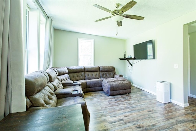 76 Kennedy Rd, West Brookfield, MA 01585 - living area featuring wood finished floors, a ceiling fan, and baseboards