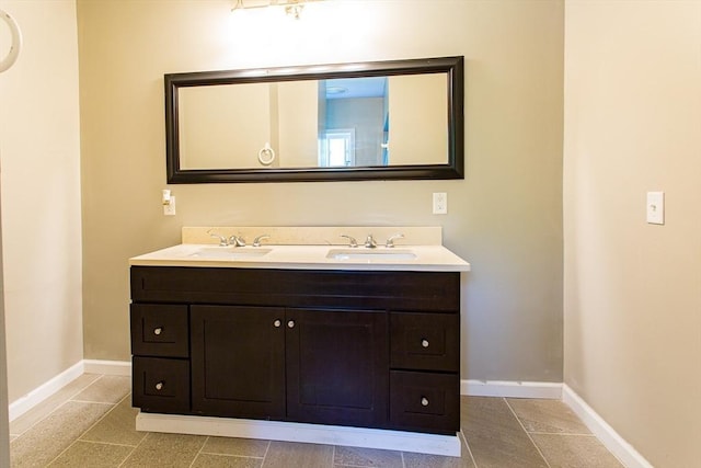 76 Kennedy Rd, West Brookfield, MA 01585 - bathroom with baseboards and double vanity