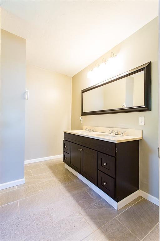 76 Kennedy Rd, West Brookfield, MA 01585 - bathroom featuring baseboards and vanity