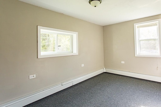 76 Kennedy Rd, West Brookfield, MA 01585 - unfurnished room featuring healthy amount of natural light, dark colored carpet, and baseboards