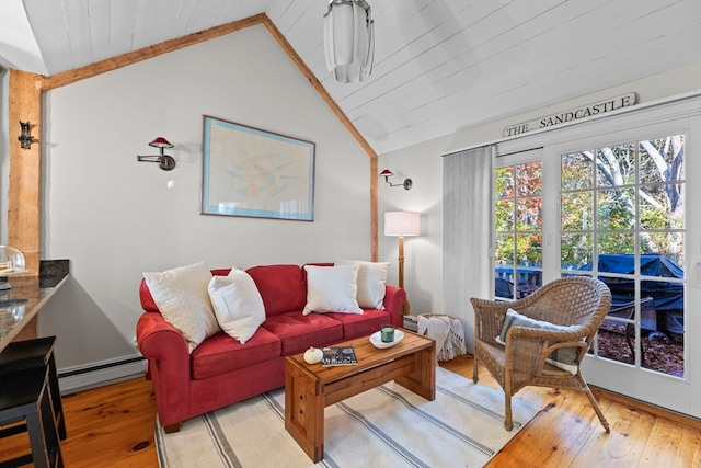 living room with wooden ceiling, light hardwood / wood-style floors, a baseboard radiator, and vaulted ceiling