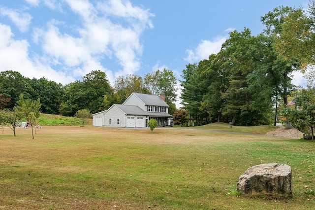 view of yard featuring a garage