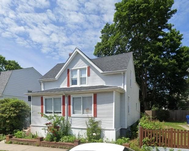 view of front of property with fence