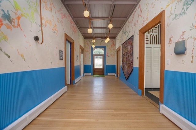 15 Estes, Amesbury, MA 01913 - hall featuring a baseboard radiator, wallpapered walls, wood finished floors, and a wainscoted wall