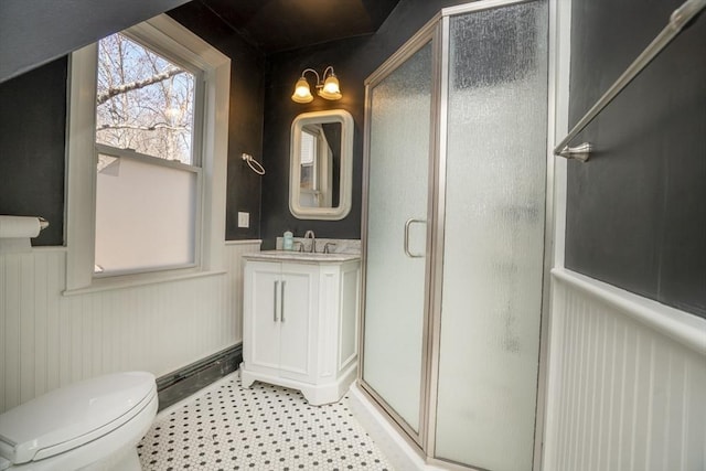 15 Estes, Amesbury, MA 01913 - bathroom with toilet, a stall shower, vanity, and wainscoting