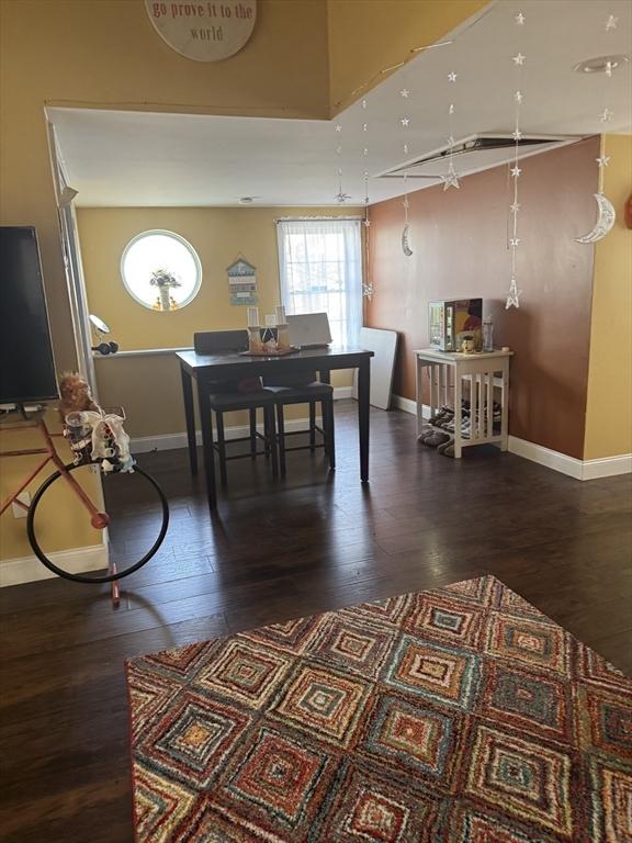 13 Coombs St, Southbridge, MA 01550 - dining space with baseboards and wood finished floors