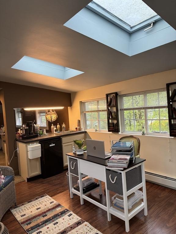13 Coombs St, Southbridge, MA 01550 - office with a baseboard heating unit, a sink, an inviting chandelier, a skylight, and wood finished floors