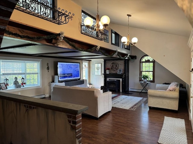 13 Coombs St, Southbridge, MA 01550 - living area with dark wood finished floors, a notable chandelier, vaulted ceiling, baseboard heating, and a baseboard radiator