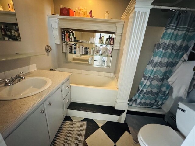13 Coombs St, Southbridge, MA 01550 - bathroom featuring curtained shower, a washtub, toilet, decorative columns, and vanity
