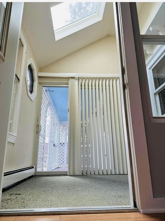 13 Coombs St, Southbridge, MA 01550 - details with a baseboard radiator and a skylight
