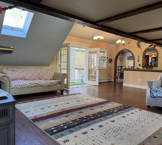 13 Coombs St, Southbridge, MA 01550 - sitting room with an inviting chandelier, a skylight, wood finished floors, and baseboards