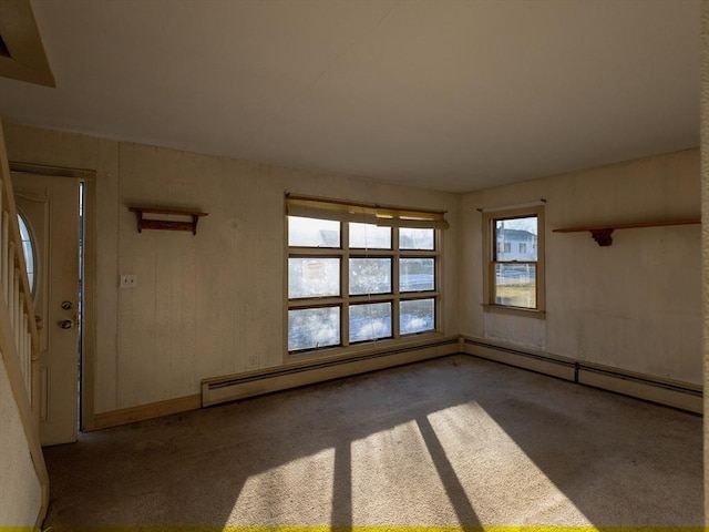 entryway featuring carpet and a baseboard heating unit