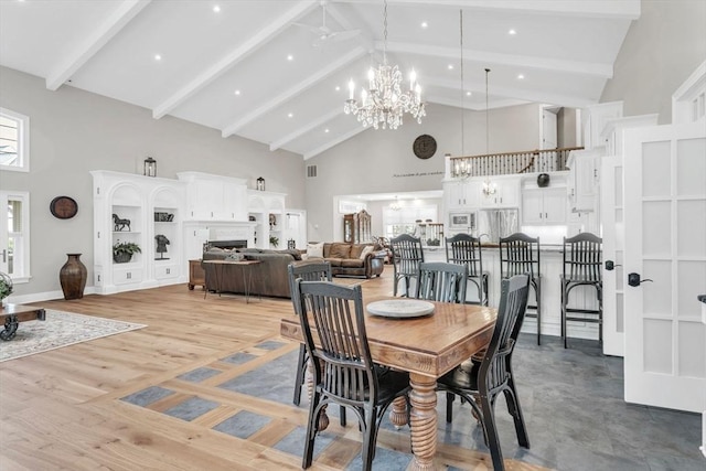 8 Fitch Farm Way, Southampton, MA 01073 - dining space featuring high vaulted ceiling, beamed ceiling, a chandelier, ceiling fan, and light wood-type flooring