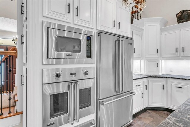 8 Fitch Farm Way, Southampton, MA 01073 - kitchen with appliances with stainless steel finishes, white cabinets, and dark stone countertops