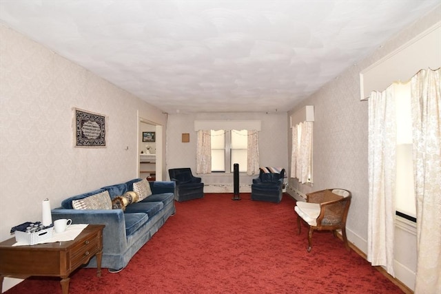 carpeted living room featuring wallpapered walls
