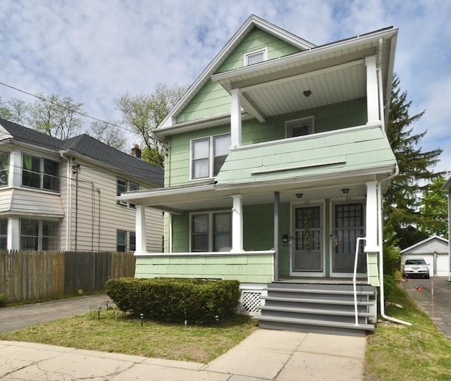 view of front of home featuring a porch and a balcony