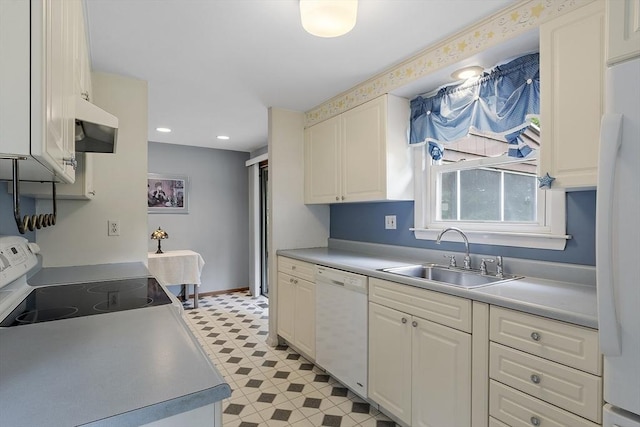 471 Lowell St, Reading, MA 01867 - kitchen featuring white appliances, extractor fan, light countertops, and recessed lighting