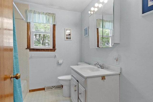 471 Lowell St, Reading, MA 01867 - bathroom featuring vanity, tile patterned floors, and shower / bath combo