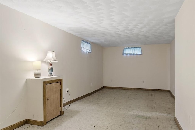 471 Lowell St, Reading, MA 01867 - below grade area featuring light flooring