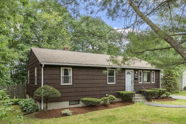 471 Lowell St, Reading, MA 01867 - view of front of property with a chimney and a shingled roof