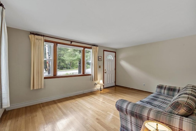 471 Lowell St, Reading, MA 01867 - living area with light wood finished floors