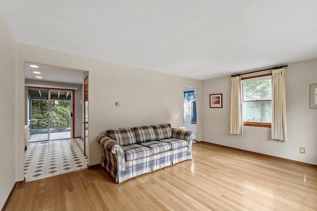 471 Lowell St, Reading, MA 01867 - living room with light wood-style floors and plenty of natural light