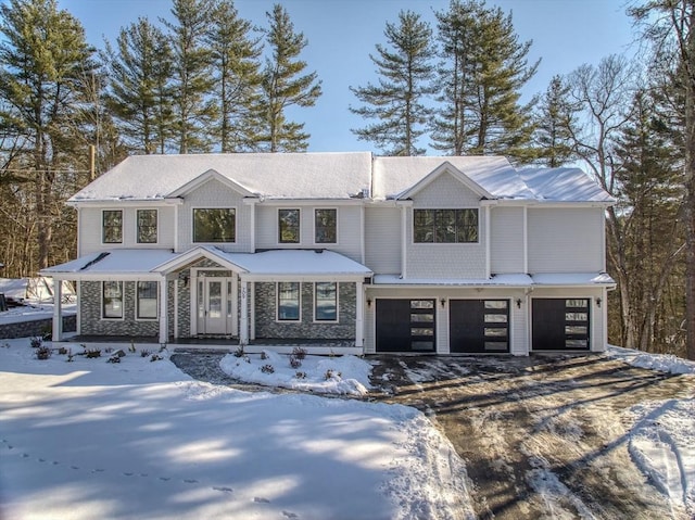 view of front of property featuring a garage