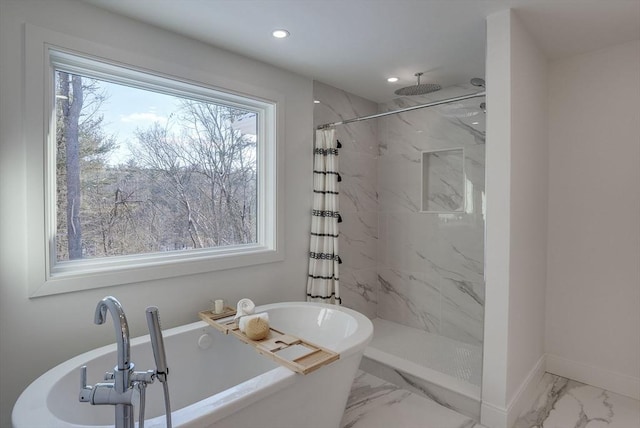 bathroom featuring plus walk in shower