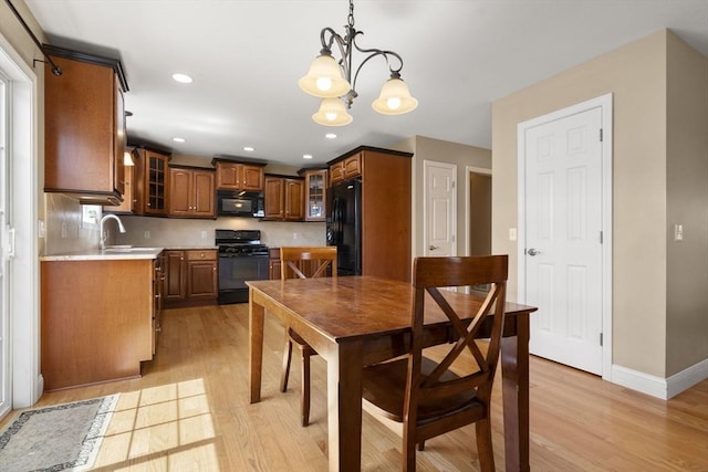 161 Bear Hole Rd, West Springfield, MA 01089 - dining space featuring recessed lighting, baseboards, an inviting chandelier, and light wood-style flooring