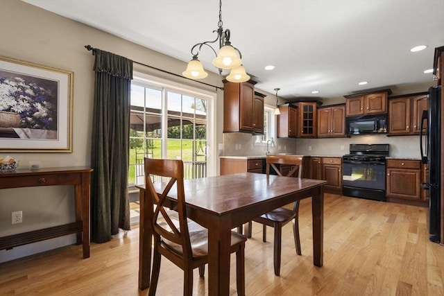 161 Bear Hole Rd, West Springfield, MA 01089 - dining room with light wood-style floors, recessed lighting, and a chandelier