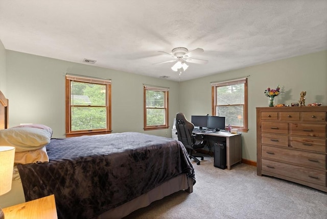 50 New Jersey Rd, Tewksbury, MA 01876 - bedroom featuring multiple windows, light colored carpet, ceiling fan, and an office area