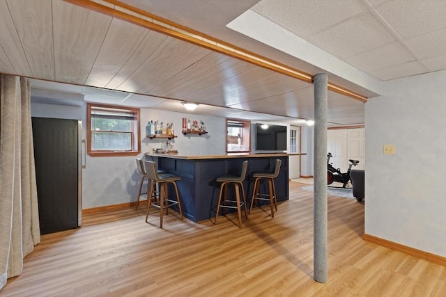 50 New Jersey Rd, Tewksbury, MA 01876 - indoor wet bar featuring baseboards and light wood-type flooring