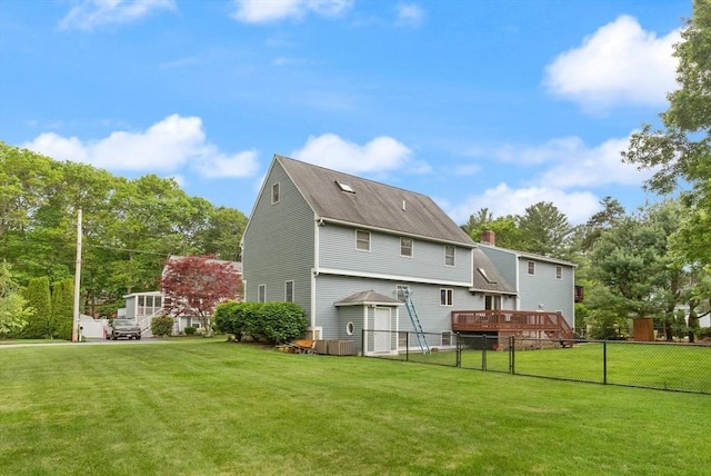50 New Jersey Rd, Tewksbury, MA 01876 - back of property with a wooden deck and central AC unit