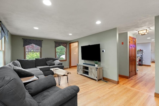 50 New Jersey Rd, Tewksbury, MA 01876 - living area with light wood-style floors, recessed lighting, and baseboards