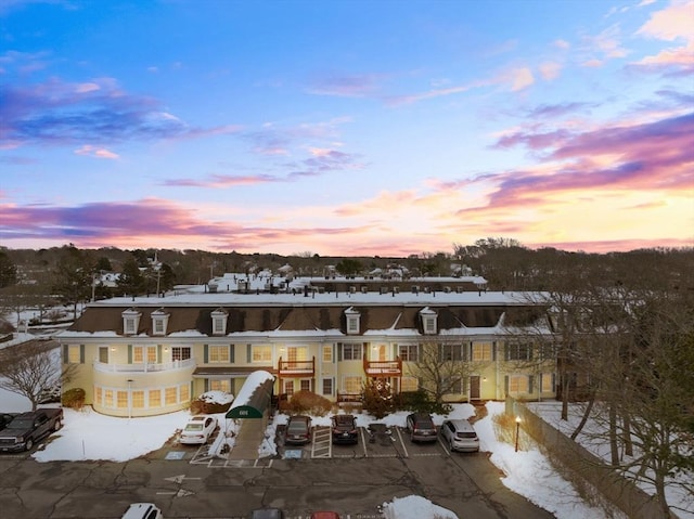 view of snow covered house