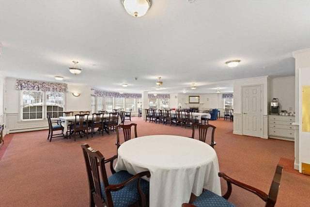 view of carpeted dining area