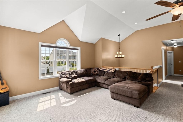 33 Beaver St, Whitman, MA 02382 - living room with a ceiling fan, carpet, baseboards, vaulted ceiling, and a chandelier