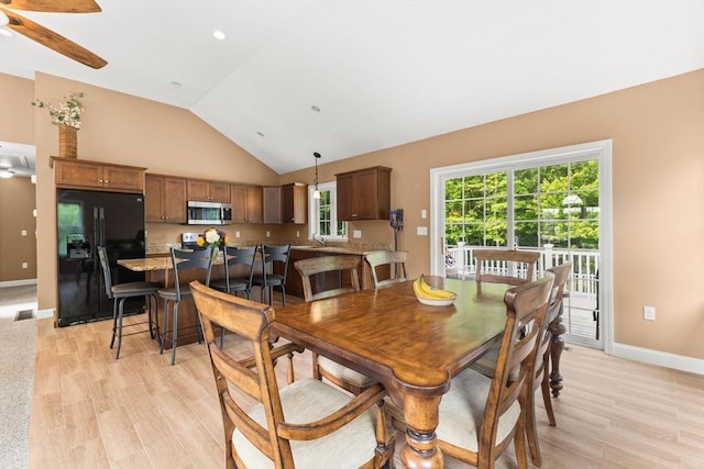 33 Beaver St, Whitman, MA 02382 - dining space with light wood-style flooring, vaulted ceiling, baseboards, and a ceiling fan